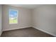 Bright bedroom with plush carpeting, offering a cozy and comfortable atmosphere at 14441 Meadow Bird Ave, Riverview, FL 33579