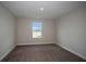 Bright bedroom with plush carpeting, offering a cozy and comfortable atmosphere at 14441 Meadow Bird Ave, Riverview, FL 33579
