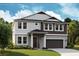 Charming two-story home with gray and white color scheme and a well-manicured front yard at 14441 Meadow Bird Ave, Riverview, FL 33579