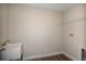 Functional laundry room features a utility sink, vinyl floor, and convenient washer/dryer hookups at 14441 Meadow Bird Ave, Riverview, FL 33579