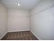 Spacious walk-in closet with neutral carpeting and wire shelving for ample storage at 14441 Meadow Bird Ave, Riverview, FL 33579