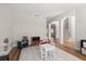 Spacious playroom with wood flooring and an open view to the staircase and the living room at 15315 Golden Beam Pl, Bradenton, FL 34211