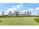 Backyard putting green for practicing your short game in a lush, private setting at 15315 Golden Beam Pl, Bradenton, FL 34211