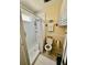 Bathroom with a shower, toilet, and cabinets at 205 Seagull N Dr, Tarpon Springs, FL 34689