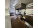 Commercial kitchen with stainless steel appliances and tiled flooring at 205 Seagull N Dr, Tarpon Springs, FL 34689