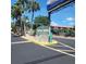 The entrance to the Tarpon Shores 55+ Community with lush landscaping and clear signage at 205 Seagull N Dr, Tarpon Springs, FL 34689