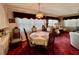 Open-concept dining area with a large window and seating at 205 Seagull N Dr, Tarpon Springs, FL 34689