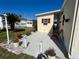 This home features a patio with landscaping and decorative accents at 205 Seagull N Dr, Tarpon Springs, FL 34689