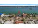 Aerial view showcases the property's waterfront location with easy access to the channel at 41 Windward Is, Clearwater Beach, FL 33767