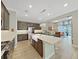 Beautiful kitchen features an island, stainless steel appliances, and an open floorplan at 4375 Barletta Ct, Wesley Chapel, FL 33543
