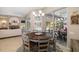 Dining area next to the sliding doors offers lots of light and easy access to the outdoor pool area at 7185 N Serenoa Dr, Sarasota, FL 34241