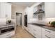 Newly updated kitchen showcasing new appliances, sleek countertops, and ample cabinetry at 7185 N Serenoa Dr, Sarasota, FL 34241