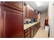 Organized pantry with ample storage and granite countertops at 7185 N Serenoa Dr, Sarasota, FL 34241
