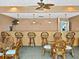 Community bar area with bar stools, tables, and chairs at 7420 Bay Island S Dr # 281, South Pasadena, FL 33707