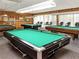 Billiard room with multiple pool tables and seating at 7420 Bay Island S Dr # 281, South Pasadena, FL 33707