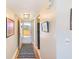 Light hallway with tile flooring, light walls, and a view through the front door to the outside at 7420 Bay Island S Dr # 281, South Pasadena, FL 33707