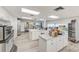 Large, open commercial kitchen with stainless steel appliances and center islands at 7420 Bay Island S Dr # 281, South Pasadena, FL 33707