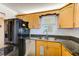 This cozy kitchen boasts stainless steel appliances, granite countertops, and ample cabinet space at 7420 Bay Island S Dr # 281, South Pasadena, FL 33707