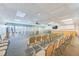 Spacious meeting room with rows of chairs and large windows at 7420 Bay Island S Dr # 281, South Pasadena, FL 33707
