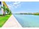 Scenic waterfront view with well-manicured landscaping and direct water access at 7420 Bay Island S Dr # 281, South Pasadena, FL 33707