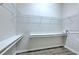 Large walk-in closet with shelving for storage at 7570 Tamarind Ave, Tampa, FL 33625