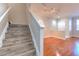 Interior view of wood staircase, with natural lighting at 7570 Tamarind Ave, Tampa, FL 33625