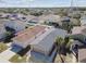 Aerial view of a residential neighborhood, highlighting lawns, driveways and mature trees at 8133 Canterbury Lake Blvd, Tampa, FL 33619