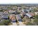 Aerial view of a quiet neighborhood showcasing well maintained homes and green landscape at 8133 Canterbury Lake Blvd, Tampa, FL 33619