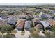 Aerial view of a residential neighborhood with homes featuring driveways and manicured yards at 8133 Canterbury Lake Blvd, Tampa, FL 33619