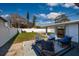 Relaxing backyard patio with ample seating, perfect for outdoor gatherings at 921 57Th N Ave, St Petersburg, FL 33703