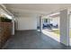 Spacious carport offers covered parking and easy access to the outdoor patio area at 921 57Th N Ave, St Petersburg, FL 33703