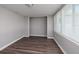 Bright, empty room with fresh paint, new flooring, and large windows at 921 57Th N Ave, St Petersburg, FL 33703