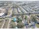Wide angle shot of a mobile home park with ponds, and some roads nearby at 10116 Tulip N St # 10116, Pinellas Park, FL 33782