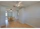 Warm dining area with wood floors and seamless flow to living room at 10116 Tulip N St # 10116, Pinellas Park, FL 33782