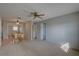 Comfortable living room with ceiling fan overlooking the dining area at 10116 Tulip N St # 10116, Pinellas Park, FL 33782