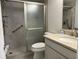 Updated bathroom featuring a tiled shower and a modern vanity at 11200 102Nd Ave # 125, Seminole, FL 33778