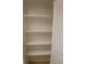 Interior view of open storage area with white shelving at 11200 102Nd Ave # 125, Seminole, FL 33778