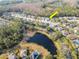 Community aerial view of the home near a pond, showcasing the neighborhood layout at 12545 Leatherleaf Dr, Tampa, FL 33626