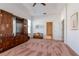 Bedroom featuring large wooden storage and an adjacent doorway to another room at 12545 Leatherleaf Dr, Tampa, FL 33626