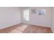 Carpeted bedroom with a window with blinds and neutral walls, providing a peaceful atmosphere at 12545 Leatherleaf Dr, Tampa, FL 33626