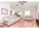 Cozy living room with plush carpeting, comfortable seating, and a view into the kitchen area at 12545 Leatherleaf Dr, Tampa, FL 33626