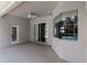 Covered pool area with a bright blue pool, a covered patio, and sliding glass doors at 12545 Leatherleaf Dr, Tampa, FL 33626
