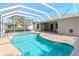 Enclosed swimming pool and back patio, perfect for outdoor entertaining at 12545 Leatherleaf Dr, Tampa, FL 33626