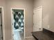 Shot of a bathroom with decorative shower curtain and black and granite counter at 13359 Orca Sound Dr, Riverview, FL 33579