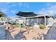 Patio overlooking backyard with above-ground pool, offering a great space for outdoor entertaining at 13507 Mango Bay Dr, Riverview, FL 33579