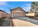 Single Gathering home with a two-car garage and neutral toned exterior at 13507 Mango Bay Dr, Riverview, FL 33579