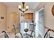 Bright dining area with natural light, washer and dryer hookups, and a glass table set at 13507 Mango Bay Dr, Riverview, FL 33579