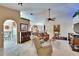 Open-concept layout showcasing the living room, dining area, and kitchen at 13507 Mango Bay Dr, Riverview, FL 33579