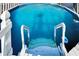 Step into relaxation with this inviting above-ground pool featuring easy access and sparkling water at 13507 Mango Bay Dr, Riverview, FL 33579