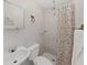 Cozy bathroom features tiled shower with modern fixtures at 16004 2Nd E St, Redington Beach, FL 33708